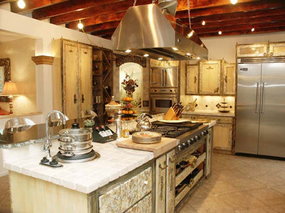 Custom gold painted cabinets are the perfect complement to the rustic and refined elements.