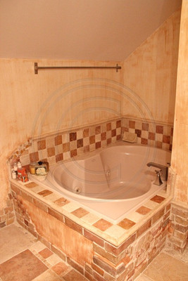Jacuzzi with marble mosaic design & separate Steam Shower