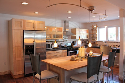 Kitchen with Murano Glass pendant lighting, marble sink & original restored-antique hardwood flooring