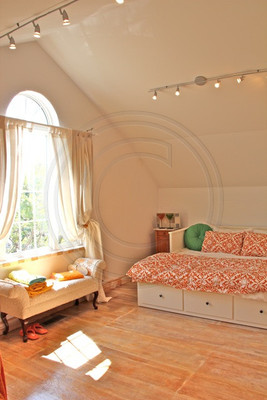 Acadian window in bedroom with Faux White Oak Floorboards