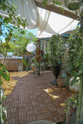 Cedar tiles lead to the massive rooftop garden from the Sunroom and also from guest house/apartment